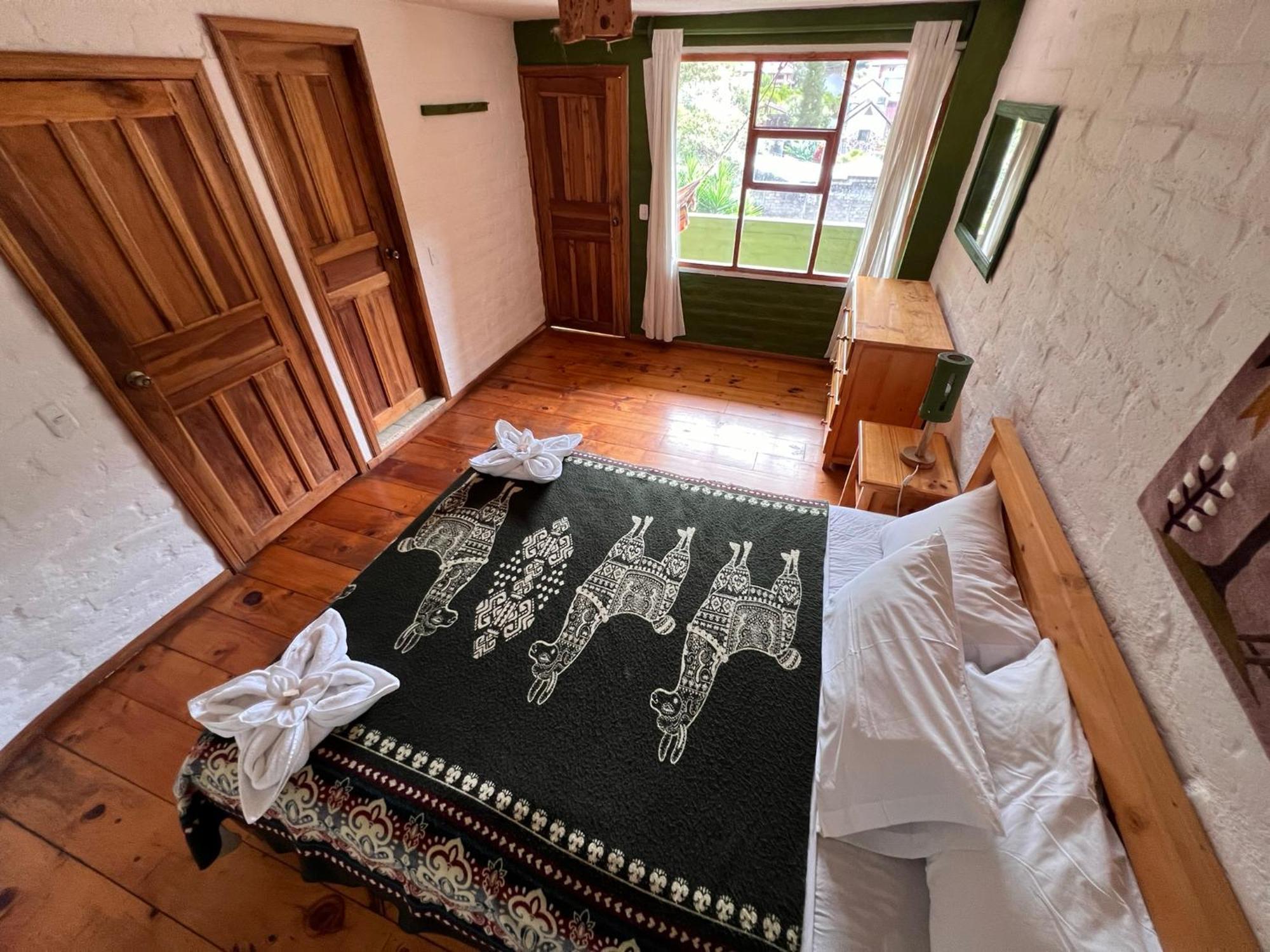 La Casa Verde Eco Guest House Baños Quarto foto