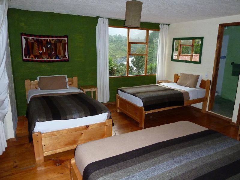 La Casa Verde Eco Guest House Baños Quarto foto